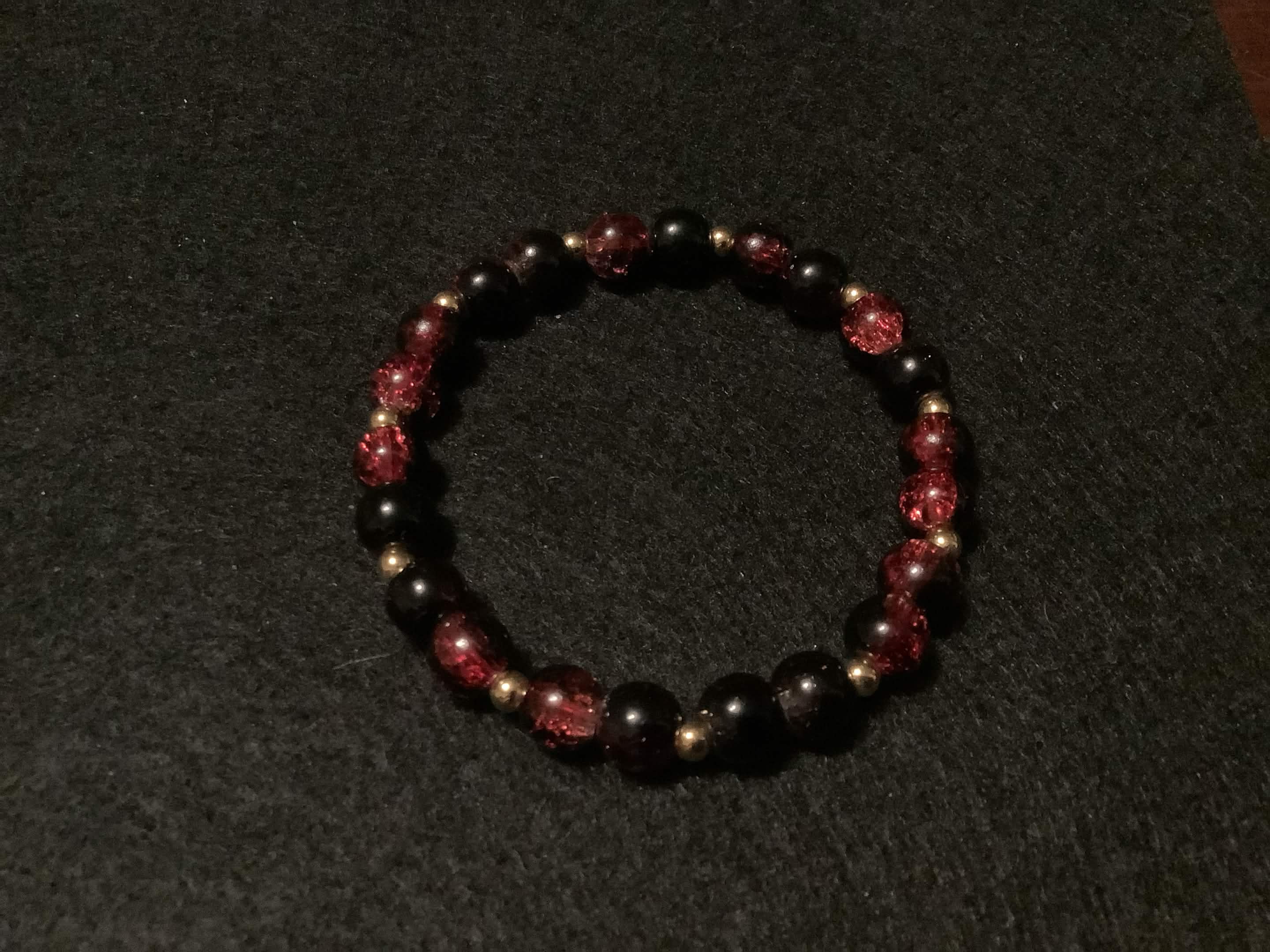 Blood Red Bracelet with Gold Spacers (7.5)