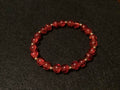 Bright Red Bracelet with Gold Spacers (7.5)